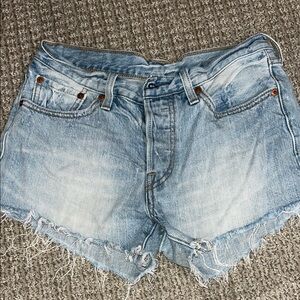 Levi's Blue Jean Shorts with Distressed Hem and Vintage Appeal